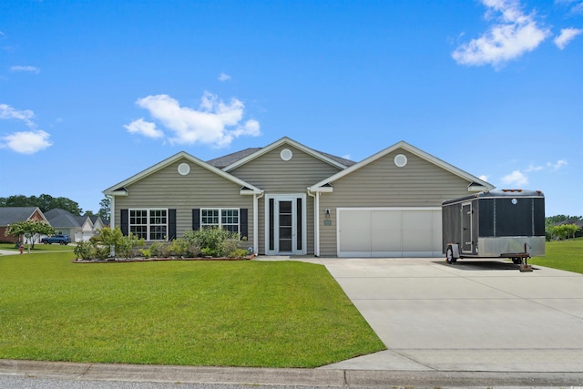 215 Vineyard Lake Cir, Conway, SC 29527 - view of front facade featuring concrete driveway, an attached garage, and a front lawn