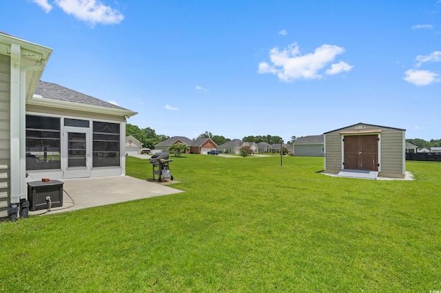 215 Vineyard Lake Cir, Conway, SC 29527 - view of grassy yard featuring a patio area, a storage shed, and a sunroom