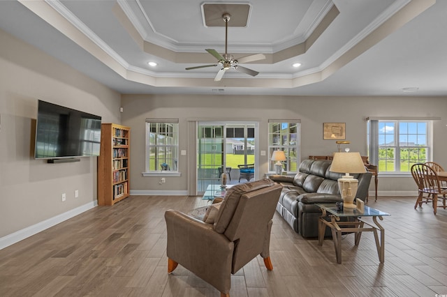 215 Vineyard Lake Cir, Conway, SC 29527 - living area with ornamental molding, a tray ceiling, wood finished floors, ceiling fan, and recessed lighting
