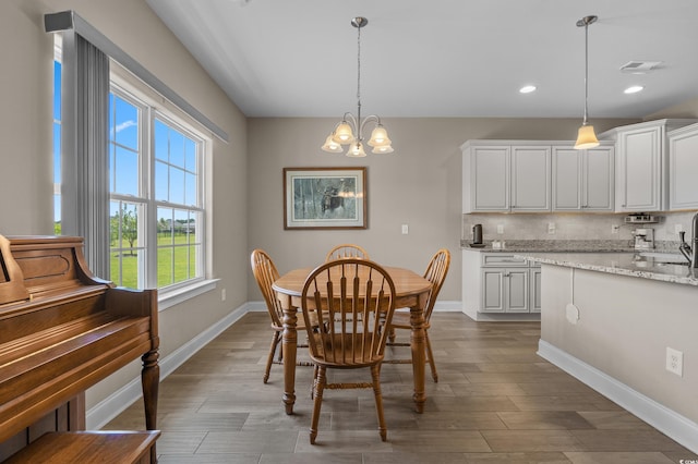 215 Vineyard Lake Cir, Conway, SC 29527 - dining space featuring a chandelier, dark wood finished floors, and recessed lighting