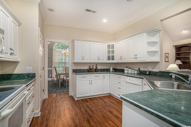 285 Georgetown Dr, Pawleys Island, SC 29585 - kitchen featuring white appliances, dark countertops, white cabinets, dark wood-style flooring, and a chandelier