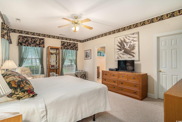 285 Georgetown Dr, Pawleys Island, SC 29585 - bedroom with light colored carpet and a ceiling fan