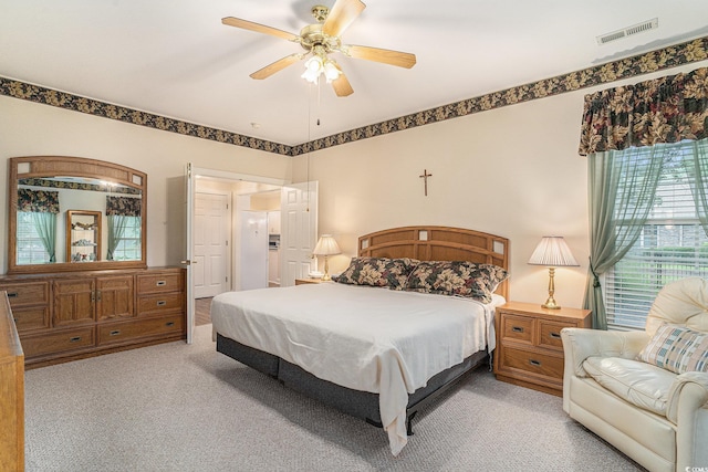 285 Georgetown Dr, Pawleys Island, SC 29585 - bedroom with light carpet and a ceiling fan