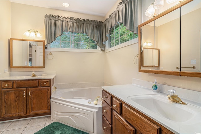 285 Georgetown Dr, Pawleys Island, SC 29585 - full bathroom with two vanities, a garden tub, and tile patterned floors