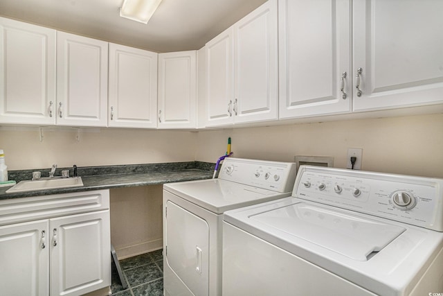 285 Georgetown Dr, Pawleys Island, SC 29585 - washroom with washer and clothes dryer, cabinet space, and dark tile patterned floors