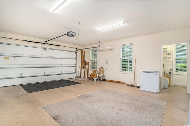 285 Georgetown Dr, Pawleys Island, SC 29585 - garage featuring a garage door opener and refrigerator
