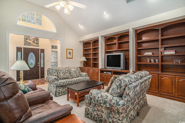 285 Georgetown Dr, Pawleys Island, SC 29585 - living room featuring light carpet, high vaulted ceiling, a ceiling fan, and healthy amount of natural light