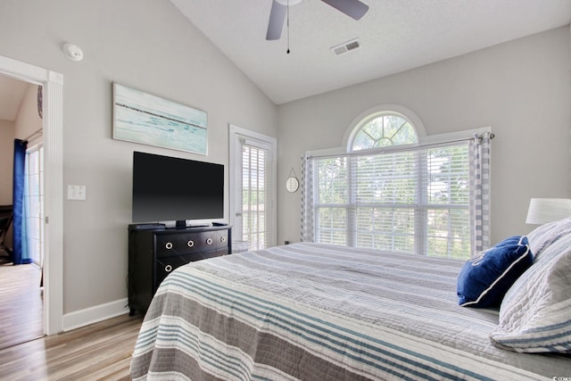 4179 Hibiscus Dr Unit 12-301, Little River, SC 29566 - bedroom featuring wood finished floors, lofted ceiling, and ceiling fan