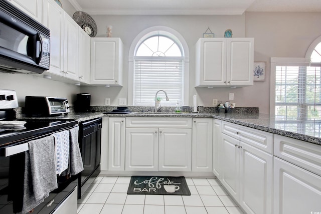 4179 Hibiscus Dr Unit 12-301, Little River, SC 29566 - kitchen featuring black appliances, white cabinetry, light tile patterned floors, stone counters, and crown molding