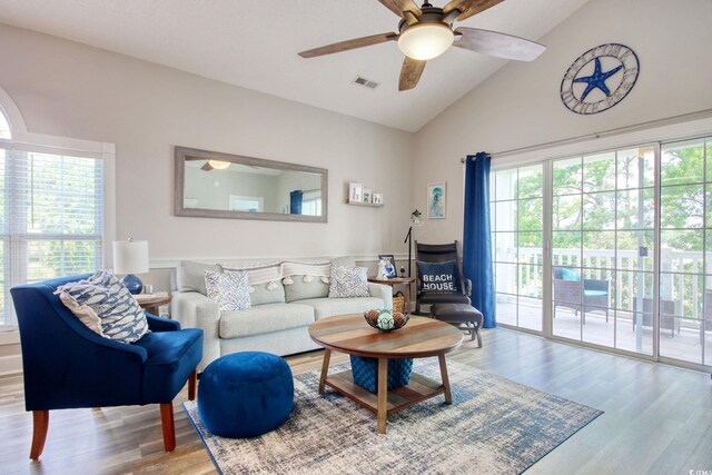 4179 Hibiscus Dr Unit 12-301, Little River, SC 29566 - living room with wood finished floors, ceiling fan, and high vaulted ceiling