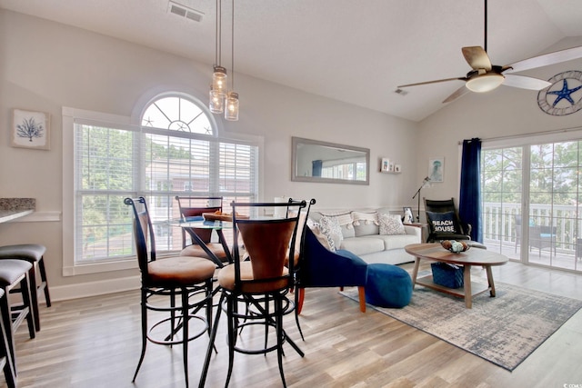 4179 Hibiscus Dr Unit 12-301, Little River, SC 29566 - dining area with vaulted ceiling, healthy amount of natural light, ceiling fan, and light wood-style floors