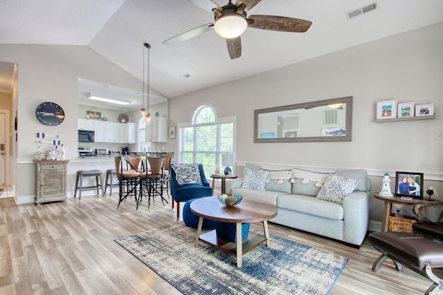 4179 Hibiscus Dr Unit 12-301, Little River, SC 29566 - living area featuring vaulted ceiling, ceiling fan, and light wood-type flooring