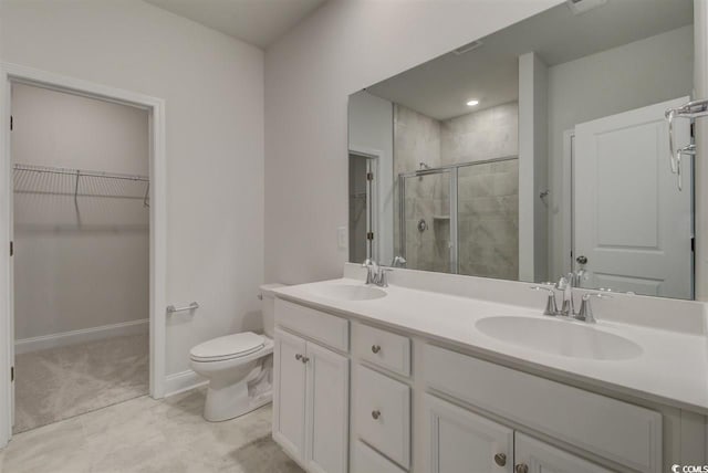 201 Augusta Green Way, Myrtle Beach, SC 29579 - bathroom featuring a stall shower, a walk in closet, and double vanity