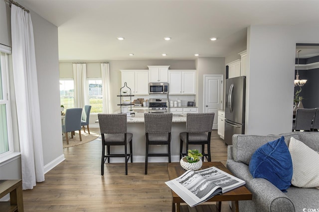 201 Augusta Green Way, Myrtle Beach, SC 29579 - living room with dark wood-style floors, a chandelier, and recessed lighting