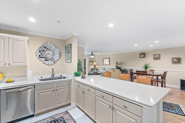 4366 Rivergate Ln Unit 404, Little River, SC 29566 - kitchen with stainless steel dishwasher, a peninsula, open floor plan, crown molding, and light countertops