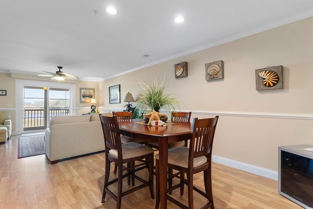 4366 Rivergate Ln Unit 404, Little River, SC 29566 - dining room with wine cooler, light wood-type flooring, crown molding, ceiling fan, and recessed lighting