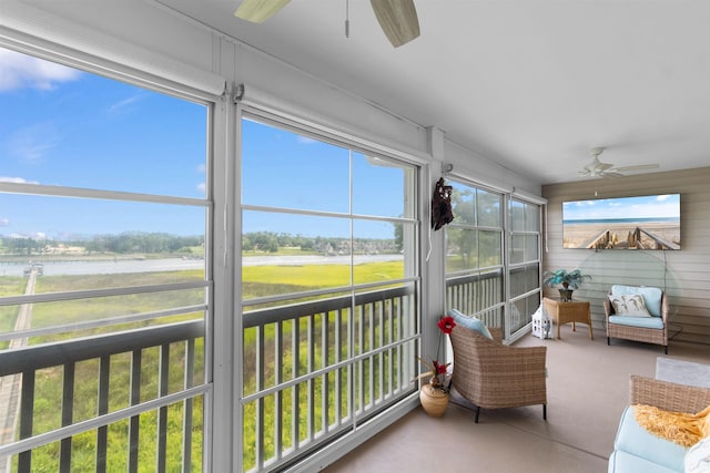 4366 Rivergate Ln Unit 404, Little River, SC 29566 - sunroom with a ceiling fan and a water view