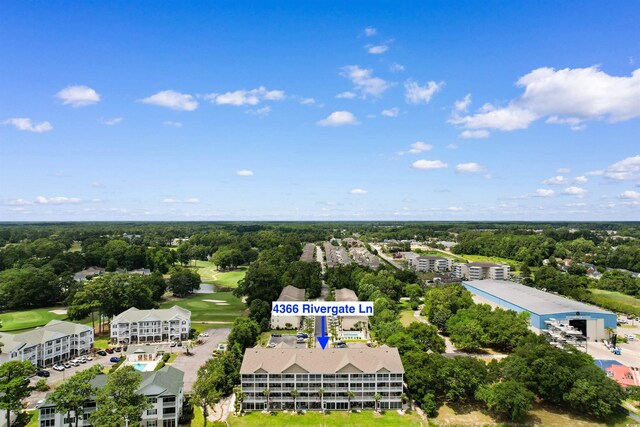 4366 Rivergate Ln Unit 404, Little River, SC 29566 - bird's eye view of a local golf course and a tree filled landscape