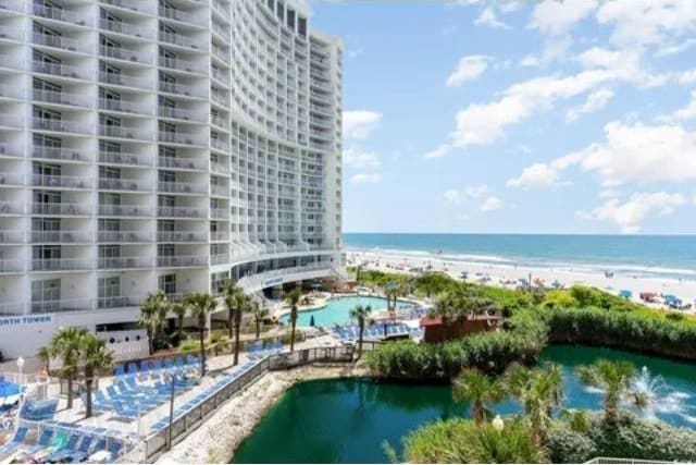 158 Sea Watch Dr Unit 707, Myrtle Beach, SC 29572 - view of swimming pool with a water view