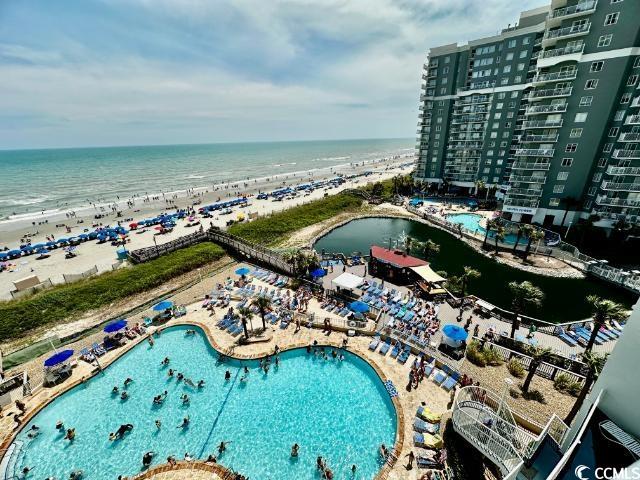 158 Sea Watch Dr Unit 707, Myrtle Beach, SC 29572 - bird's eye view of a pool and extended coastline