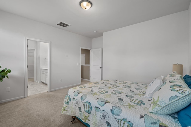 4737 Seclusion Ln, Myrtle Beach, SC 29577 - bedroom with light colored carpet and connected bathroom