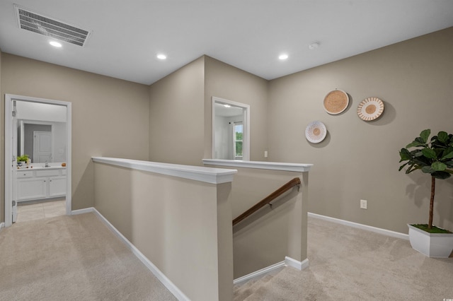 4737 Seclusion Ln, Myrtle Beach, SC 29577 - corridor with an upstairs landing, light colored carpet, and recessed lighting