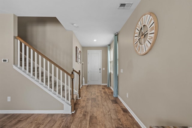 4737 Seclusion Ln, Myrtle Beach, SC 29577 - entrance foyer with wood finished floors, stairs, and recessed lighting