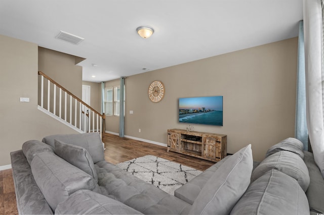 4737 Seclusion Ln, Myrtle Beach, SC 29577 - living area with wood finished floors and stairs