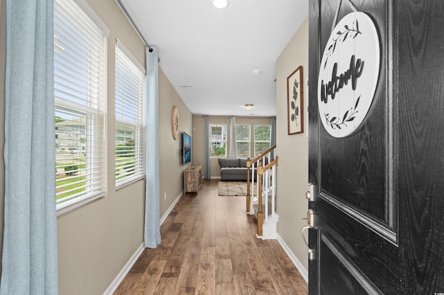 4737 Seclusion Ln, Myrtle Beach, SC 29577 - foyer entrance with baseboards and wood finished floors