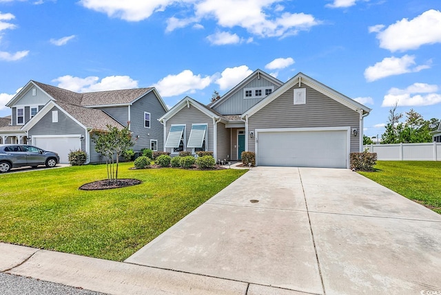 325 Cardita Loop, Myrtle Beach, SC 29588 - view of front facade with board and batten siding, driveway, and an attached garage