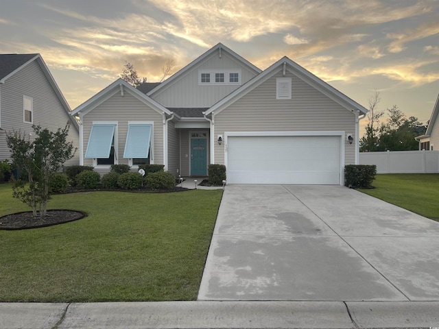 325 Cardita Loop, Myrtle Beach, SC 29588 - view of front of house featuring board and batten siding, driveway, and an attached garage