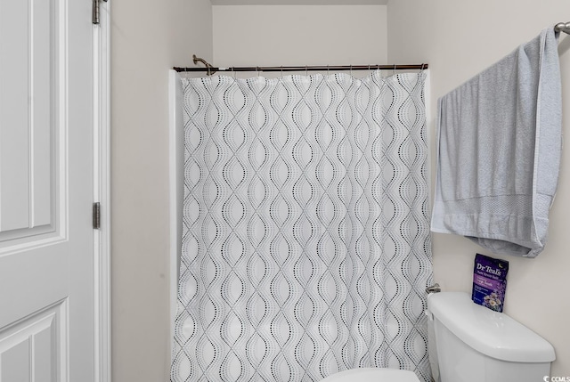 325 Cardita Loop, Myrtle Beach, SC 29588 - bathroom with toilet and a shower with shower curtain