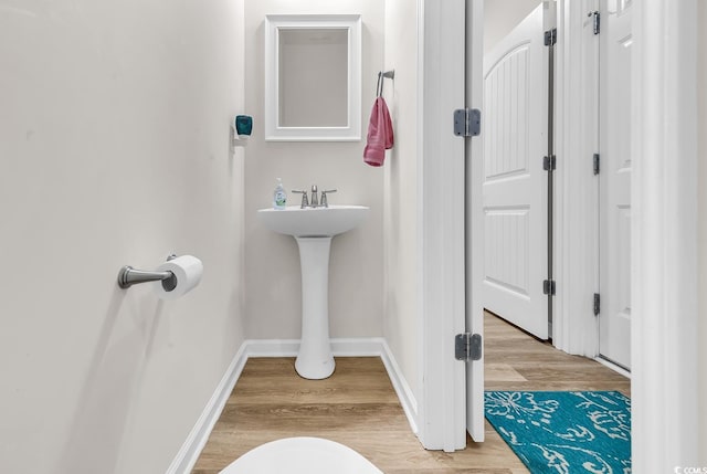 325 Cardita Loop, Myrtle Beach, SC 29588 - bathroom featuring wood finished floors and baseboards