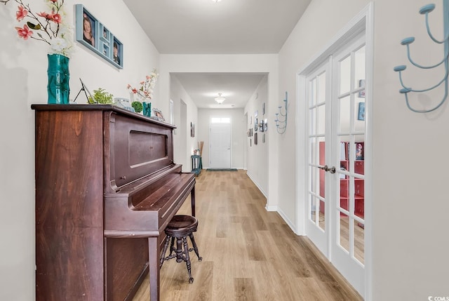 325 Cardita Loop, Myrtle Beach, SC 29588 - hallway featuring light wood-style floors and french doors
