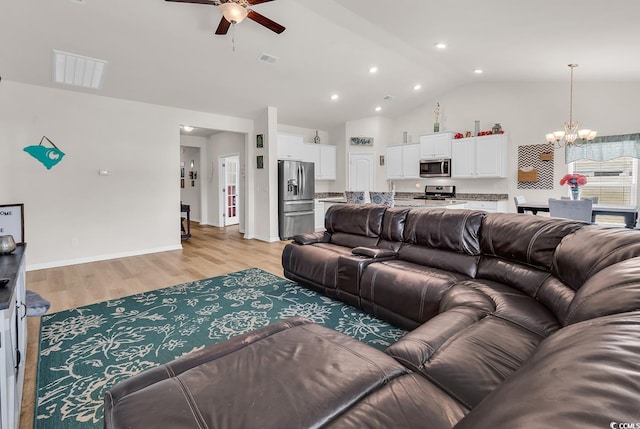 325 Cardita Loop, Myrtle Beach, SC 29588 - living area with a chandelier, a ceiling fan, light wood-type flooring, high vaulted ceiling, and recessed lighting