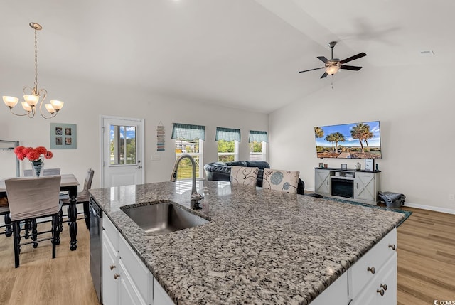 325 Cardita Loop, Myrtle Beach, SC 29588 - kitchen with open floor plan, light wood-type flooring, ceiling fan, plenty of natural light, and high vaulted ceiling