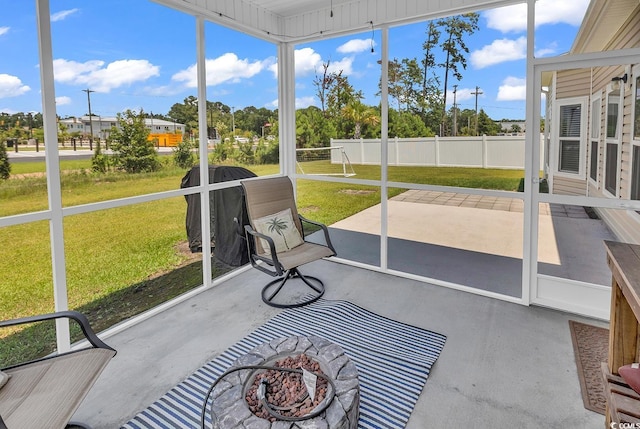 325 Cardita Loop, Myrtle Beach, SC 29588 - unfurnished sunroom featuring a fire pit
