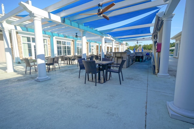530 Inverarry St, Murrells Inlet, SC 29576 - view of patio featuring outdoor dining space, a pergola, a ceiling fan, and an outdoor kitchen