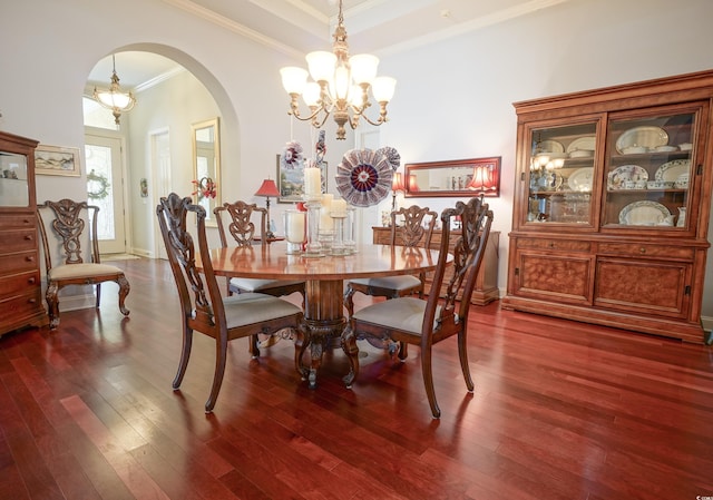 530 Inverarry St, Murrells Inlet, SC 29576 - dining area with a chandelier, arched walkways, crown molding, and dark wood-type flooring