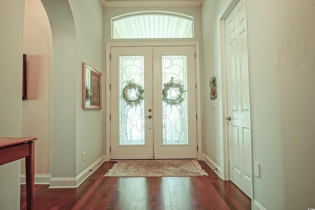530 Inverarry St, Murrells Inlet, SC 29576 - foyer entrance with arched walkways, hardwood / wood-style flooring, french doors, and ornamental molding