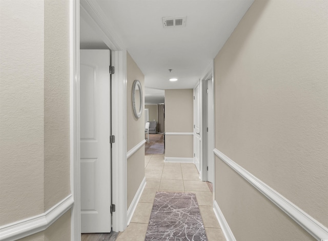 1819 N Ocean Blvd Unit 1518, North Myrtle Beach, SC 29582 - hall with light tile patterned floors and baseboards