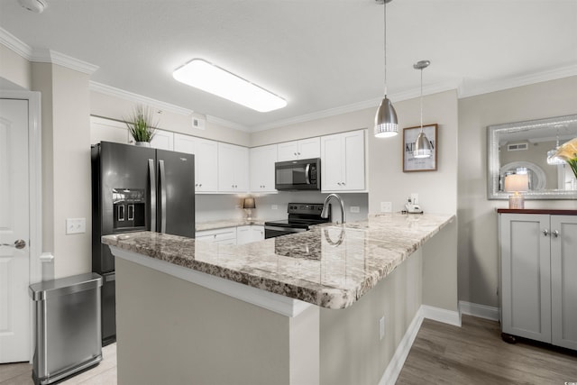 1819 N Ocean Blvd Unit 1518, North Myrtle Beach, SC 29582 - kitchen with black electric range oven, a peninsula, light stone countertops, white cabinets, and ornamental molding
