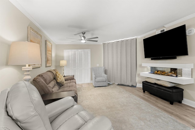 1819 N Ocean Blvd Unit 1518, North Myrtle Beach, SC 29582 - living area featuring wood finished floors, ceiling fan, and crown molding