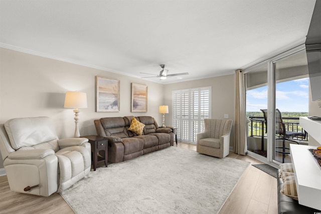 1819 N Ocean Blvd Unit 1518, North Myrtle Beach, SC 29582 - living area featuring light wood-style flooring, a ceiling fan, and ornamental molding