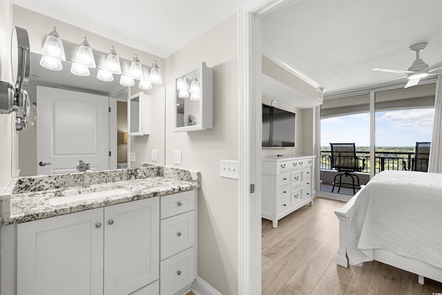 1819 N Ocean Blvd Unit 1518, North Myrtle Beach, SC 29582 - bathroom featuring vanity, wood finished floors, and a ceiling fan