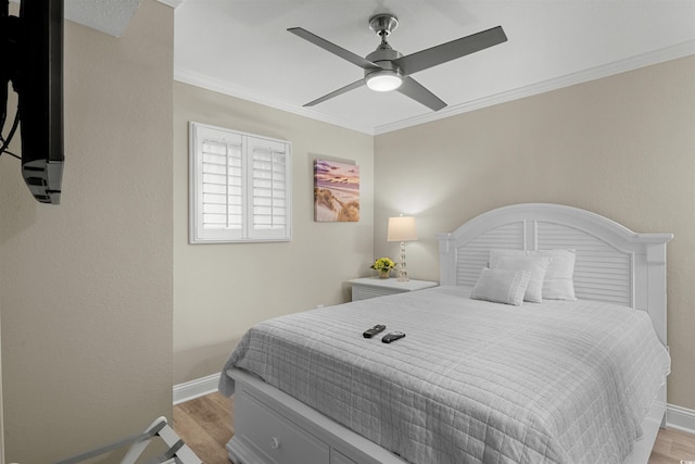 1819 N Ocean Blvd Unit 1518, North Myrtle Beach, SC 29582 - bedroom featuring light wood-style flooring, crown molding, and ceiling fan