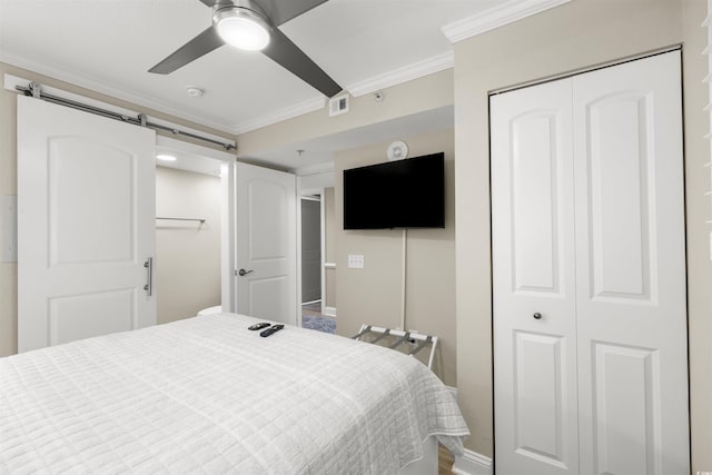 1819 N Ocean Blvd Unit 1518, North Myrtle Beach, SC 29582 - bedroom featuring ornamental molding, a closet, and a ceiling fan