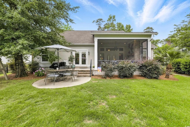 175 Chapel Creek Rd, Pawleys Island, SC 29585 - back of house with a patio area, a yard, a sunroom, and french doors