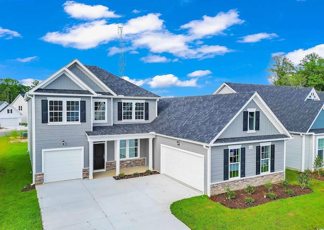 1012 Fowler Rd, Conway, SC 29526 - craftsman house with stone siding, driveway, and a front yard