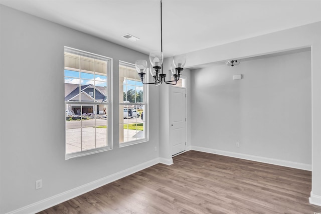 1012 Fowler Rd, Conway, SC 29526 - unfurnished dining area featuring a chandelier and wood finished floors